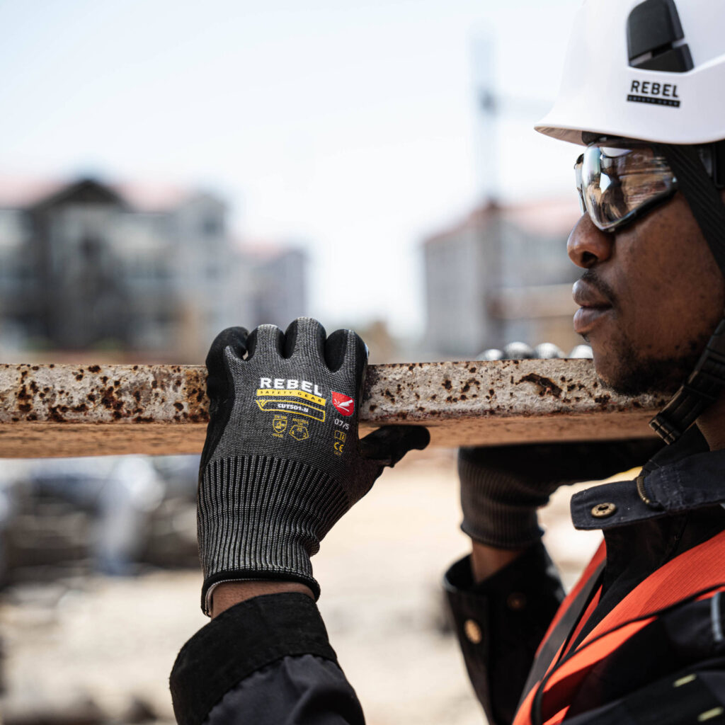 rebel cut pro wrist length gloves styled holding scaffolding