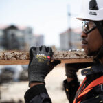 rebel cut pro wrist length gloves styled holding scaffolding