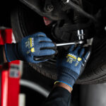 rebel versa wrist length gloves styled closeup working on car